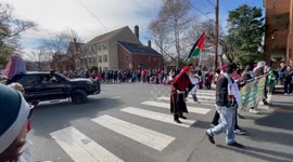 Palestinian American Friendship & Cultural Association members walking in the 53rd Annual Alexandria, Virginia USA Scottish Christmas Walk Parade