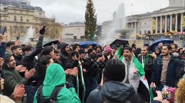 Syrians celebrating the fall of the Assad regime. Trafalgar Square, London, UK 08/12/2024