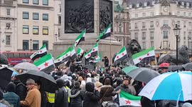 Syrians celebrating the fall of the Assad regime. Trafalgar Square, London, UK 08/12/2024