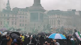 Flares lit as Syrians celebrate the fall of the Assad regime. Trafalgar Square, London, UK 08/12/2024