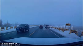 Truck sliding on slippery road captured on dashcam in Xinjiang, China