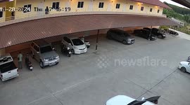 Bungling thief tries to flee from police along rooftop but tumbles over