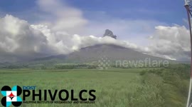 Philippine volcano erupts, spews plume of ash, gas