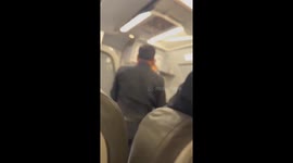 Passengers and crew wrestle man who 'tried to take over plane mid-air'