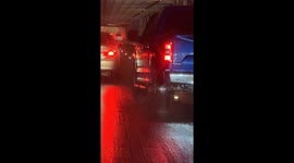 Man Hangs From Back of Moving Corvette