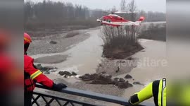 Italy: Firefighters Airlift Woman Trapped on Flooded River Islet in Reggio Emilia