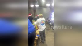 US: 44th Precinct Officers Team Up with Waste Connection to Build Bikes for Holiday Giveaway