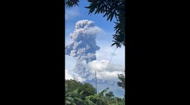 Massive cloud of gas rises from Kanlaon Volcano as it erupts in the Philippines