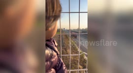 Moment dad who had to work on daughter's birthday surprises her with balloons