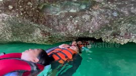 Experience the thrill of floating through a narrow cave