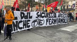 Protesters marching behind the banner with the slogan ‘The security bill arrests you too, let's stop them!’ during the demonstrations organized by both the Movements for the Right to Housing and the grassroots union SI COBAS, which joined together in a si