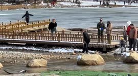 Man fails to jump from one rock to another, hits groin, Sichuan, China