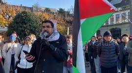 Switzerland: A member of the Basel 4 Palestine group give a speach before starting the march trough the streets of the city
