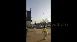 Two men amaze with badminton feat, rallying SIX shuttlecocks at once
