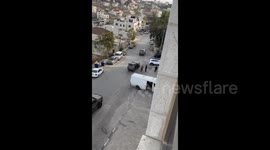 Israeli forces detain Palestinian youths during their raid on the town of Silwad, northeast of Ramallah