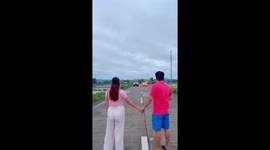 Couple's gender reveal has smoke poppers spewing out from cars