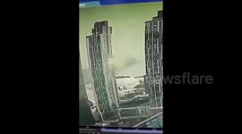 Debris falls after gas explosion erupts from high-rise in China