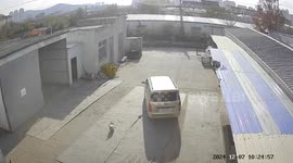 Instant karma as delivery driver chases barking dog only to see vehicle roll and crash into wall
