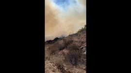 California Wildfires 2024: Franklin Fire burns on a hillside nearby Costa Del Sol in Malibu, California