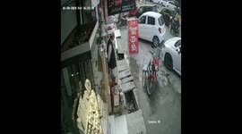 Man trips and falls into street canal in Wah Cantt, Pakistan