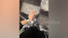 Climber captures challenging ascent of mountain in China
