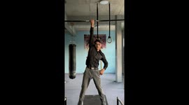 Solo strength: A man in China masters one-armed pull-up in gym