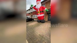 Man orders 4ft inflatable Santa - but gets one taller than his house