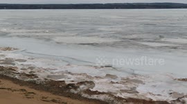 Cool touch of blue ice on Lake Superior