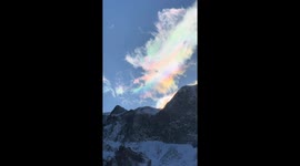 Auspicious skies: Dragon-shaped rainbow cloud graces Changbai Mountain in China