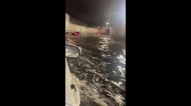 Cars nearly submerged in a flooded tunnel in Boston, USA