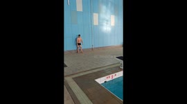 Friend slips and injures leg while attempting dive into pool in Heilongjiang, China