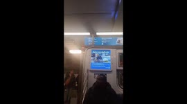Transit train stops during rush hour in New York, USA