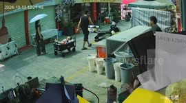 Man nearly crashes into scooter in Guangdong, China