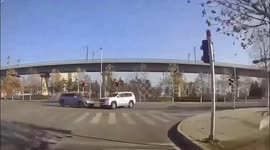 Collision between two cars at traffic lights in Guangzhou, China