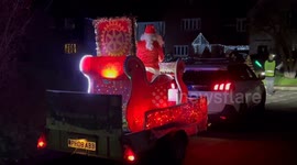 Santa Claus visits village of Bridge, England