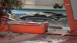 US, Los Angeles: Redlands Vehicle Crashes Through Wall And Lands In Swimming Pool