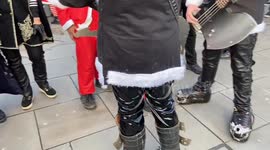 KISS-mas and a samba band liven up the party as hundreds of Santas take part in SantaCon