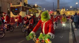 Hundreds of Santas Ride through central London