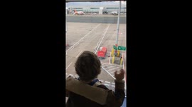 4 year old's first time on a plane- he dances with excitement!