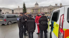 Police arrest Santa Claus activist who climbed into London's Trafalgar Square Christmas tree
