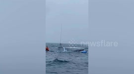 Tourists rescued from capsized ferry off Thai island