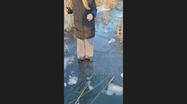 Person falls through thin ice in Belovo, Kemerovo Oblast, Russia