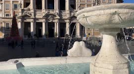 In the background, the Papal Basilica of Santa Maria Maggiore seen from the fountain in Piazza Santa Maria Maggiore, in the foreground, restored for the Jubilee in Rome.