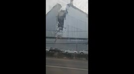 Concrete block falls onto road when crane hoist snaps