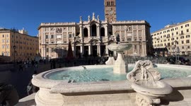 In the foreground, the fountain in Piazza Santa Maria Maggiore restored for the Jubilee and in the background the Papal Basilica of Santa Maria Maggiore in Rome.