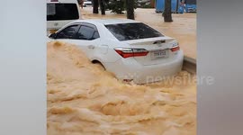 Floods swamp tourists on Thai 'Death Island' Koh Tao
