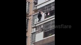 Four-Year-Old Girl Trapped on 8th-Floor Balcony Rescued by Barehanded Renovation Worker