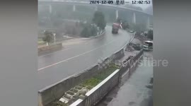 Lorry cargo overturns and crashes into passenger bus injuring 16 passengers