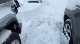 Residents battle through thick snow from blizzards in Buffalo, New York