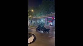 Batman seen riding motorcycle along road in China